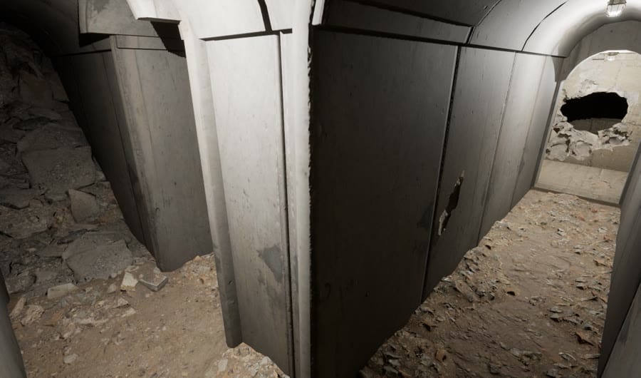 Mission 1, the tunnel: a concrete passage with a rubble floor